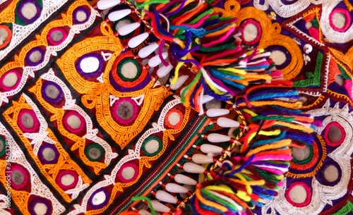 Patchwork quilt in kutch Gujarat india needlework embroidery art work as a kind of needlework  creativity and art.best indian traditional embroidery art. Threads for embroidery selective focus