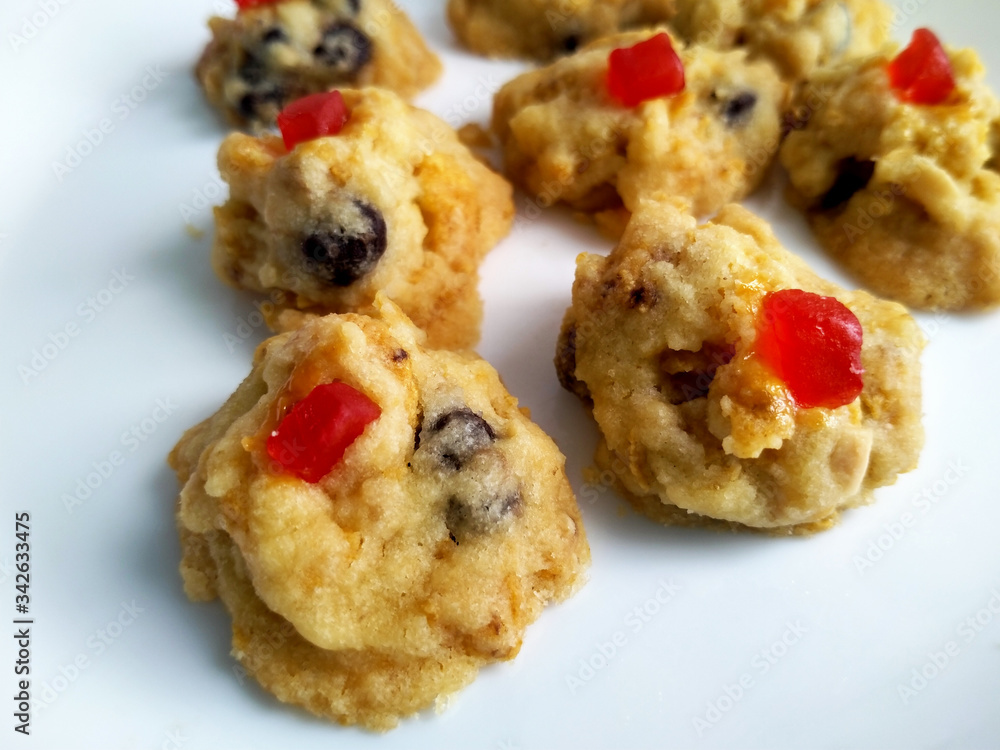 Red pearl biscuit. The main ingredients are flour, cornflakes, chocolate chips, and cherries. Cook in a hot oven. Red pearl biscuit. The main ingredients are flour, cornflakes, chocolate chips, and cherries. Cook in a hot oven.