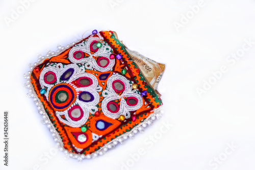 Wallet with money and credit cards Sketch of wallet full of cash Wallet, selective focus, 200 rupee in embroidery pocket or wallet,embroidery handicrafts wallets