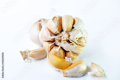 Garlic or Allium sativum isolated on white background. © fridayimages