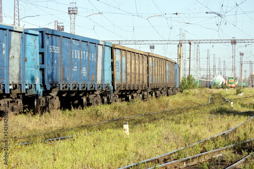 Kharkiv, Ukraine - August 23, 2018: Cargo wagons parked at the railway station Osnova, in Kharkiv, Ukraine photo