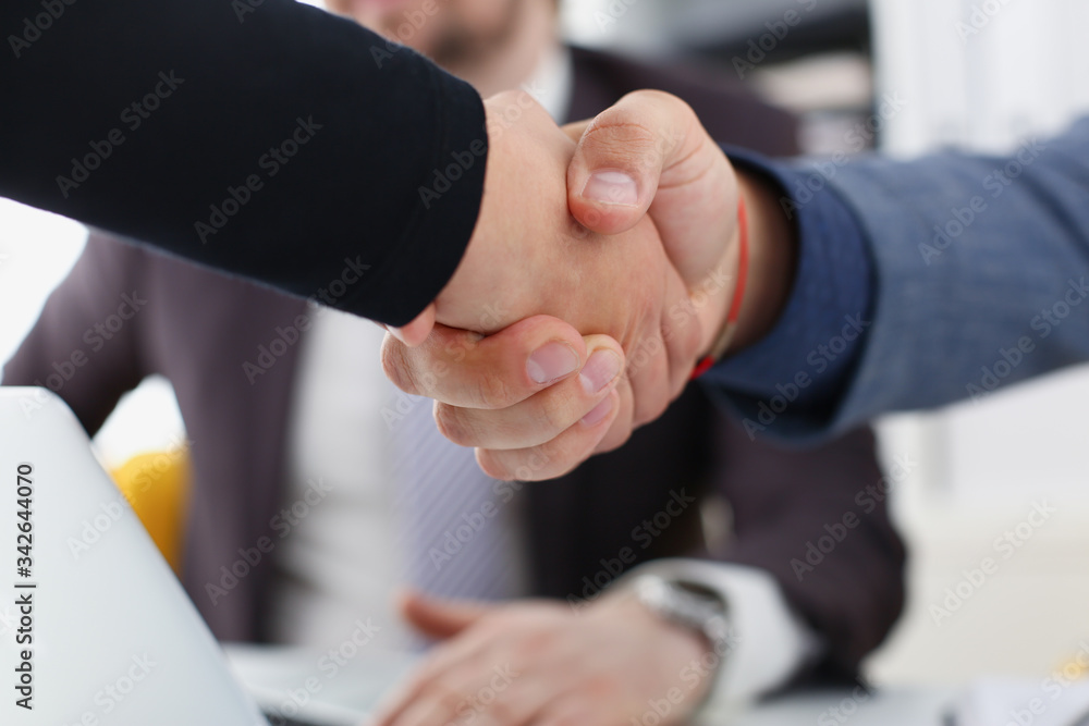 young happy businessmen have meeting in office shake hands with each other make success deal concept young happy businessmen have meeting in office shake hands with each other make success deal concept