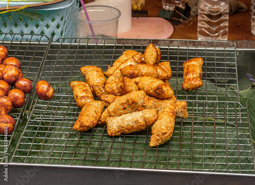 Loock Chin plaa tod. An asian style fried fish sausages ready to eat. photo