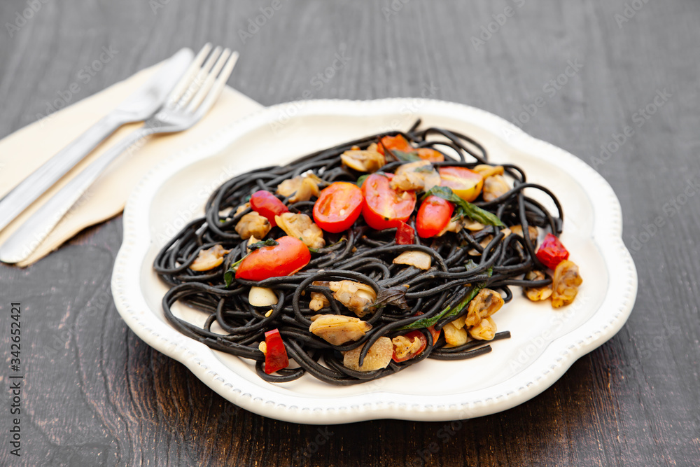 Black pasta Spaghetti alle Vongole Seafood pasta with Clams Black pasta Spaghetti alle Vongole Seafood pasta with Clams