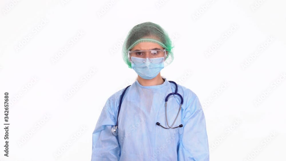 Young doctor showing clipboard with Stay Home text, coronavirus pandemic concept Young doctor showing clipboard with Stay Home text, coronavirus pandemic concept