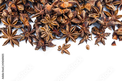 heap star anise top view on white background.