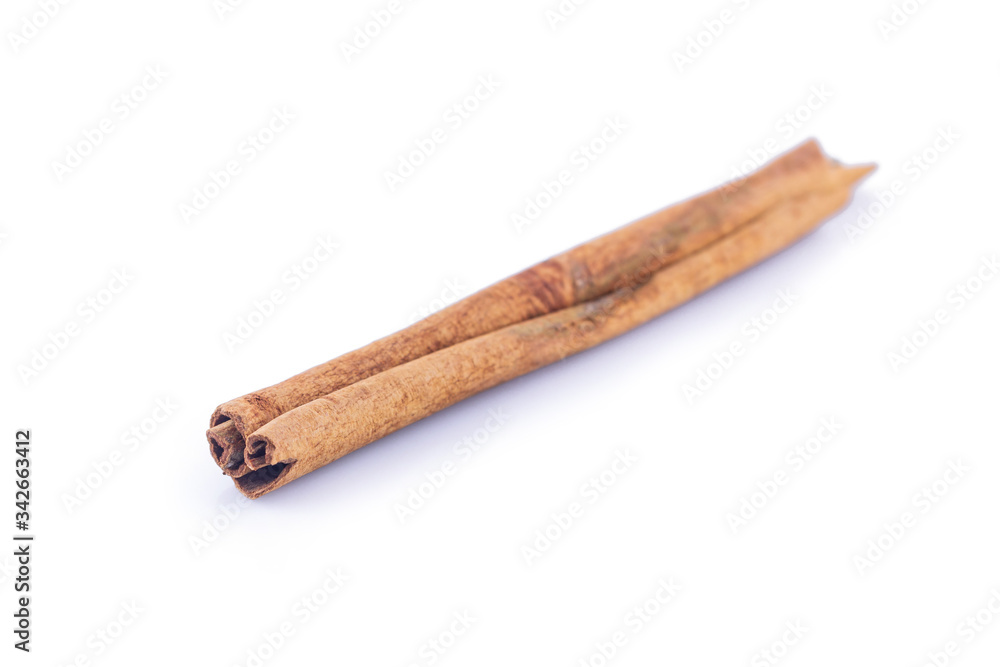 cinnamon on white background front view close up. cinnamon on white background front view close up.