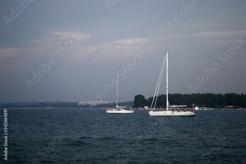 Yacht in the sea. Landscape with a yacht in the sea before the rain
