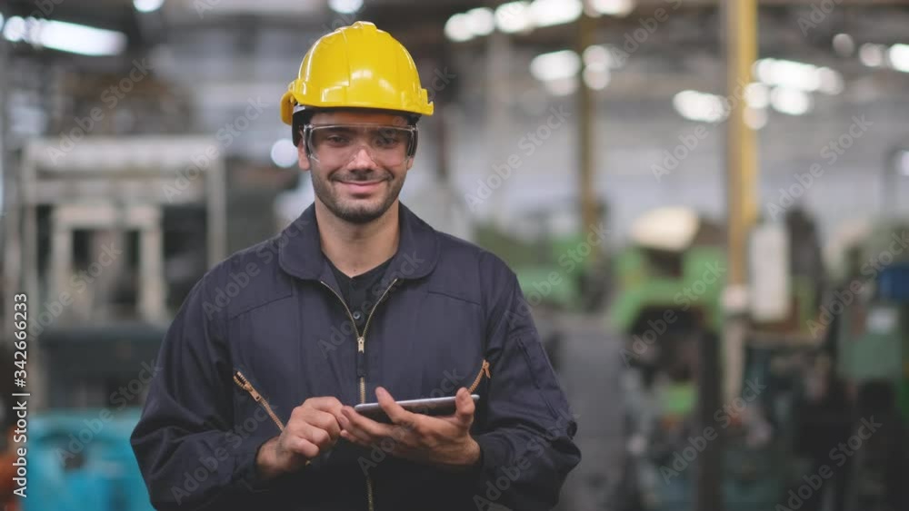 Roderick Smart Engineer Smart engineer or technician use tablet then smile to camera in the ...