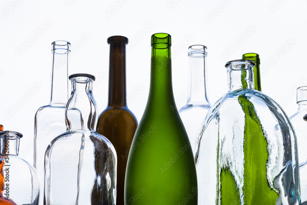various empty bottles and view of gray sky various empty bottles and view of gray sky