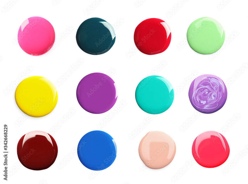 Set of different nail polishes on white background Set of different nail polishes on white background