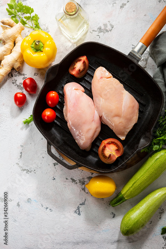 Raw meat and vegetables ready for griling photo