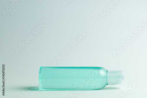 Plastic Bottle of Transparent Alcohol Sanitizer Hand Gel for Antibacterial to protect your health from virus corona, Covid-19, and bacteria on a white background within studio light