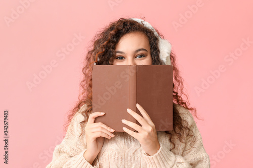 Young woman in warm sweater...
