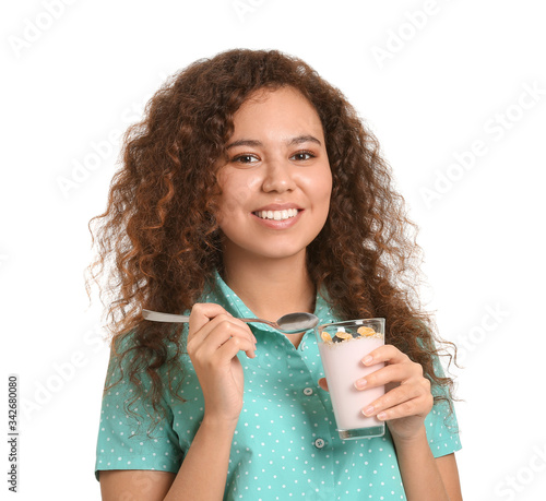 Young woman with tasty yogu...