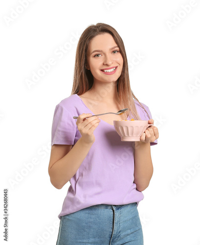 Young woman with tasty yogu...