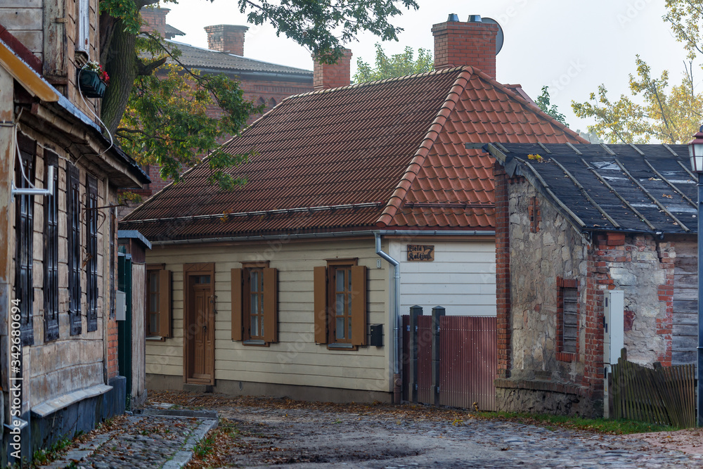 CESIS / LATVIA - SEPTEMBER 2015: Street with residential houses in the old town of Cesis, Latvia