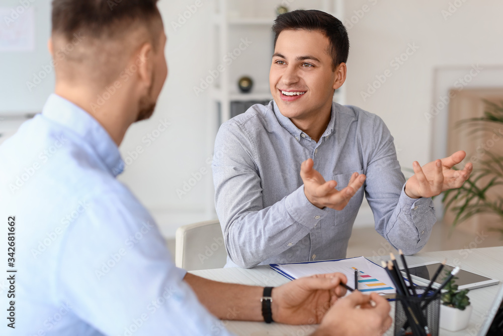 Business people having meeting in office Business people having meeting in office