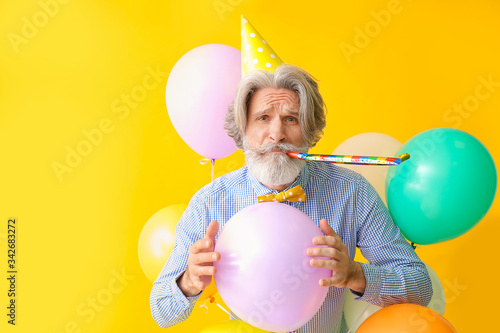 Senior man celebrating Birt...