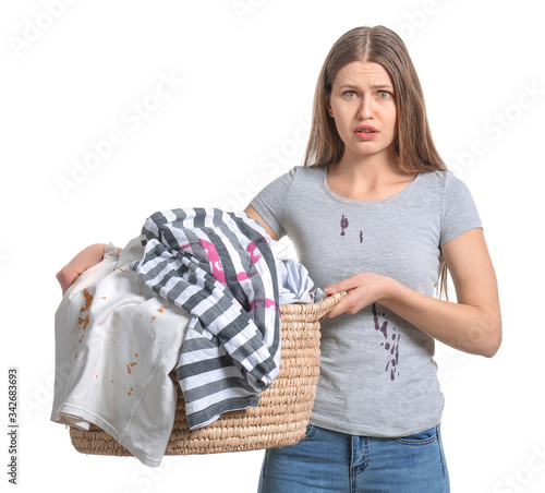 Sad woman with dirty clothe...