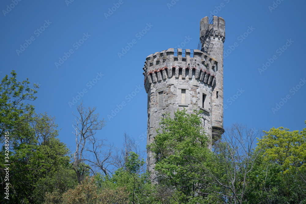 Belfry in the forest against the sky. Belfry in the forest against the sky.