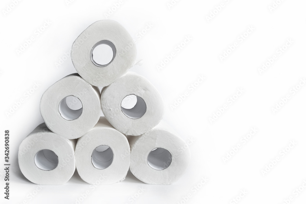 Toilet paper rolls on white backgorund. Hygiene concept. White paper texture. Household concept. Toilet paper rolls on white backgorund. Hygiene concept. White paper texture. Household concept.