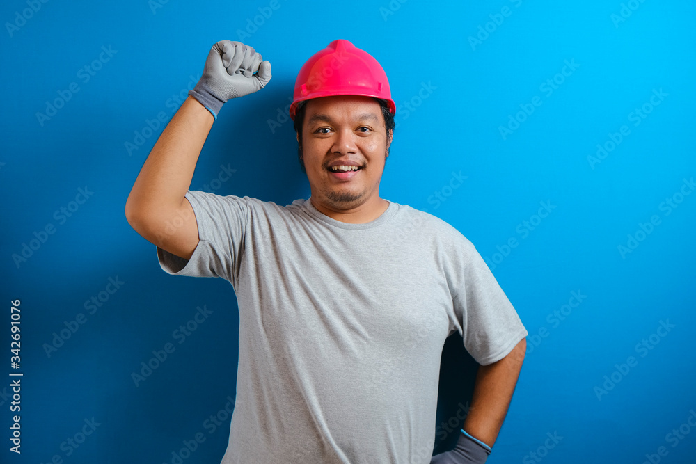 fat asian man wearing red helmet