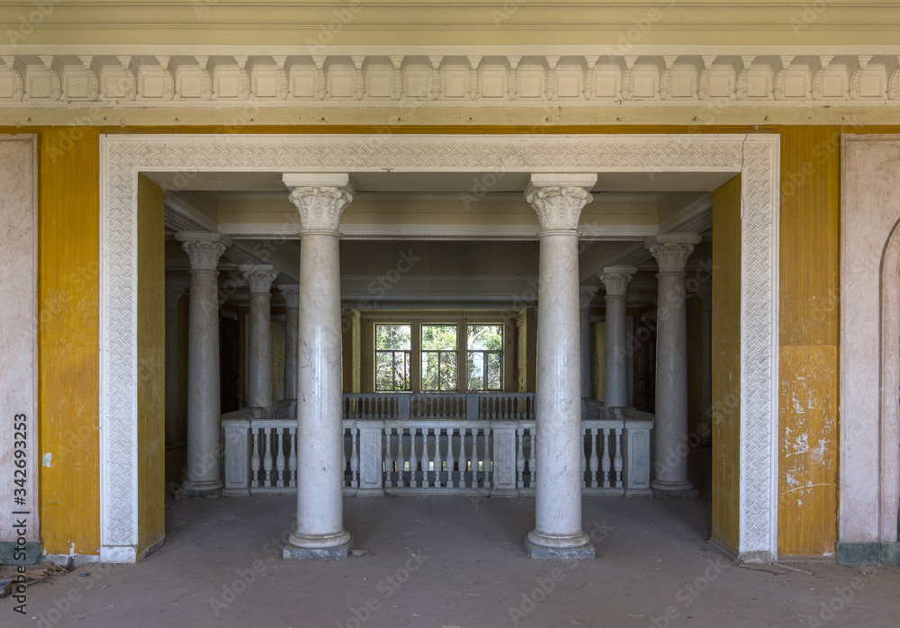 Hall with columns in the old abandoned manor