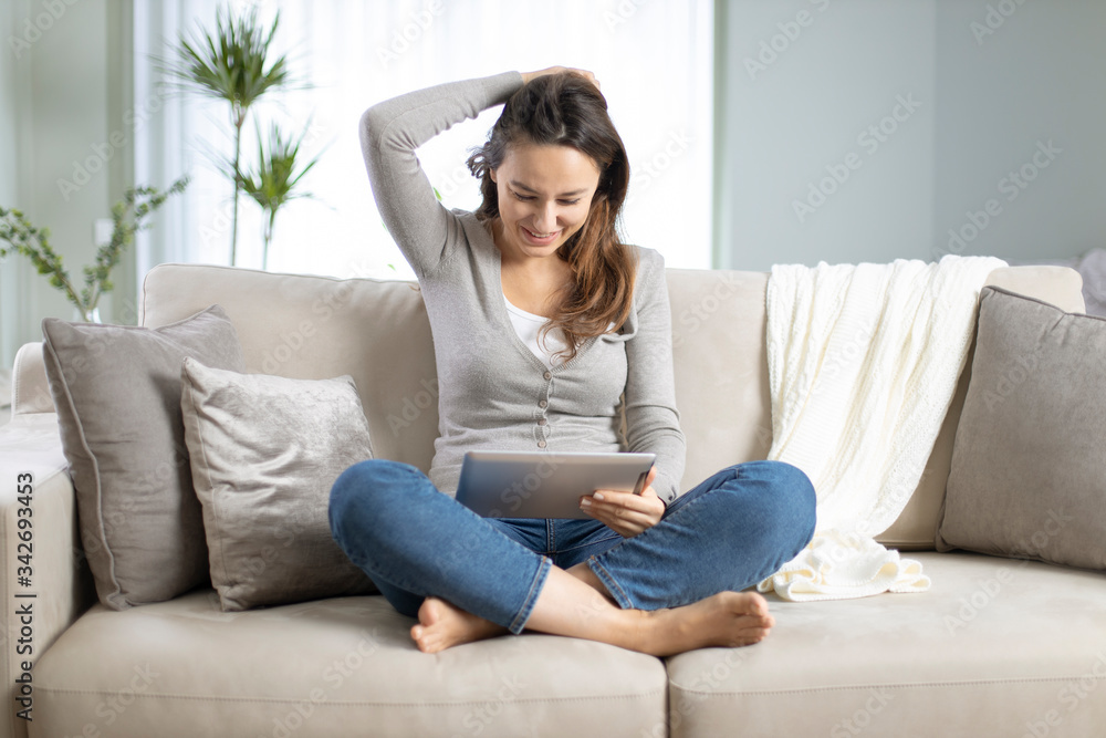 Young woman using tablet pc Young woman using tablet pc