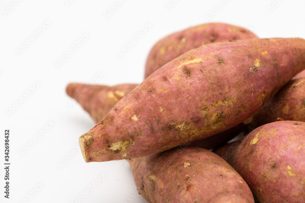 Pile of Japanese potato isolated on white background Pile of Japanese potato isolated on white background
