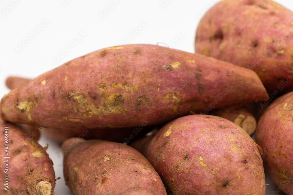 Pile of Japanese potato isolated on white background Pile of Japanese potato isolated on white background