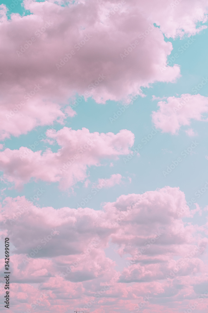 Aesthetic beautiful turquoise sky with pink clouds. Minimal creative concept of angel paradise