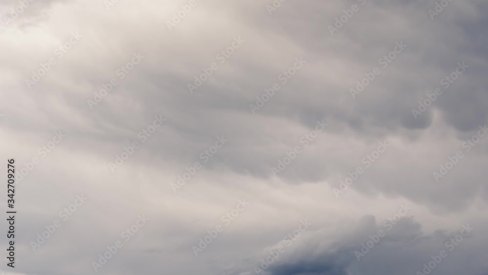 Zoom out dramatic time lapse clouds forming after summer storm. Sun shining on Alps mountains and Ljubljana basin land covered with fields and forest Zoom out dramatic time lapse clouds forming after summer storm. Sun shining on Alps mountains and Ljubljana basin land covered with fields and forest