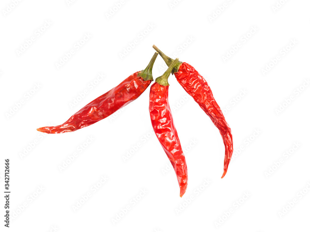 Three red chili pepper pods isolated on white Three red chili pepper pods isolated on white