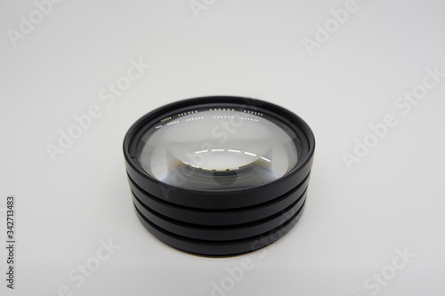 A pile of close up lens 58 mm for camera accessories

