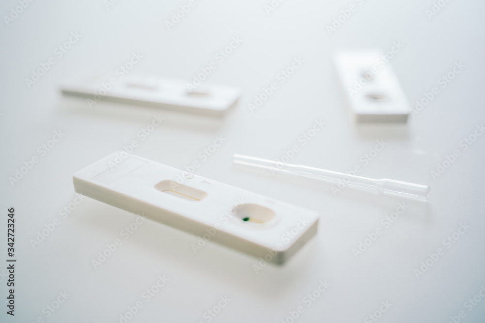 Rapid tests for detection of Covid-19 on white background. Rapidly spread respiratory virus. Massive tests to avoid contagion and start de-escalation. Rapid tests for detection of Covid-19 on white background. Rapidly spread respiratory virus. Massive tests to avoid contagion and start de-escalation.
