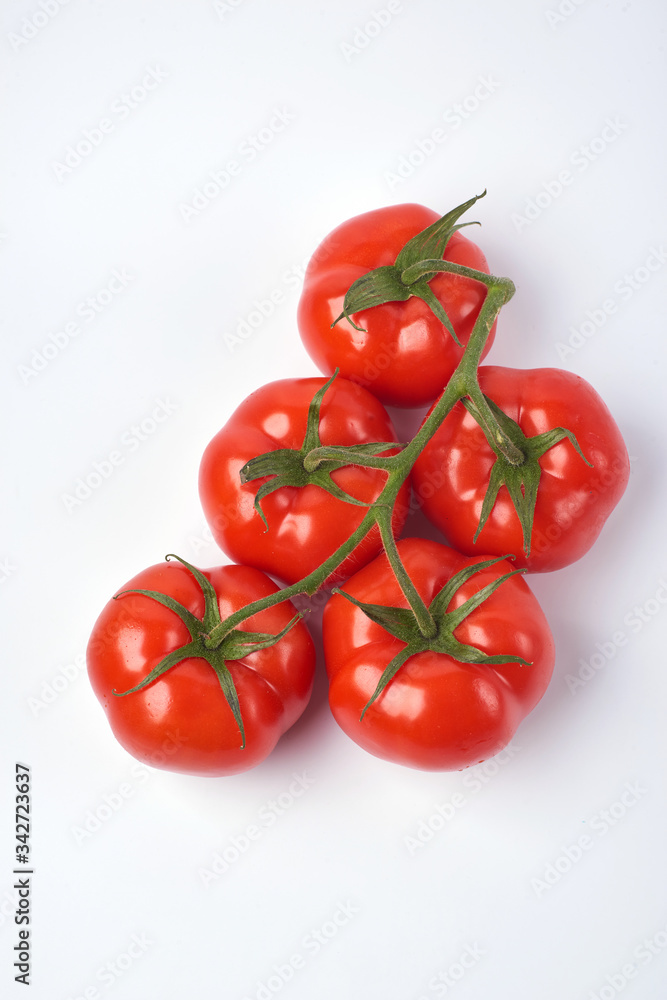 Tomato isolate. Tomato on a white background. Tomatoes top view, side View. With the path cut off. Tomato isolate. Tomato on a white background. Tomatoes top view, side View. With the path cut off.