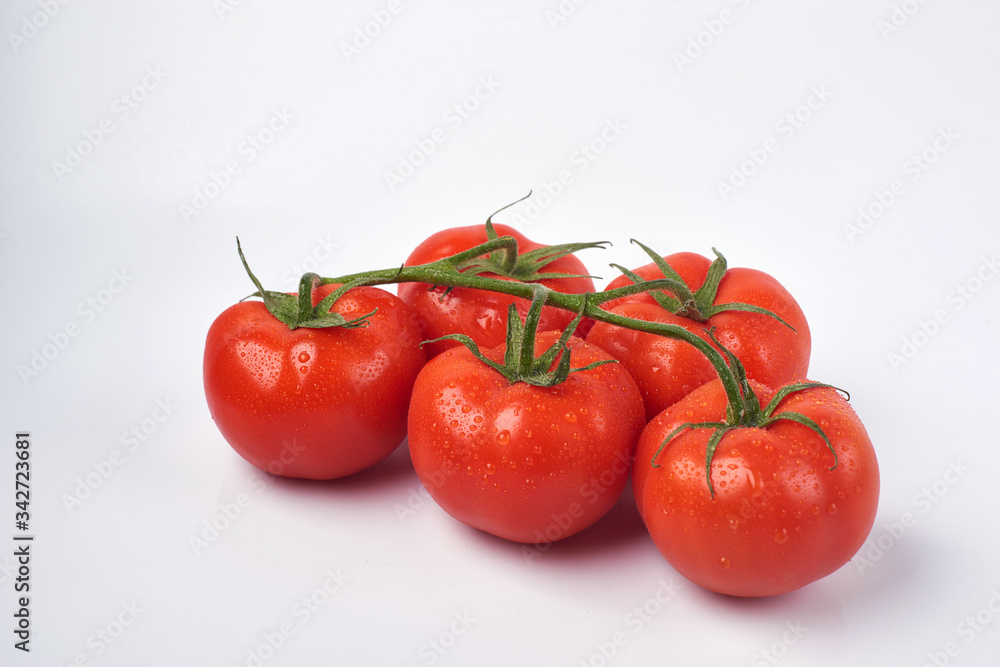 Tomato isolate. Tomato on a white background. Tomatoes top view, side View. With the path cut off. Tomato isolate. Tomato on a white background. Tomatoes top view, side View. With the path cut off.