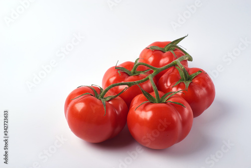Tomato isolate. Tomato on a white background. Tomatoes top view, side View. With the path cut off. © Mikhail