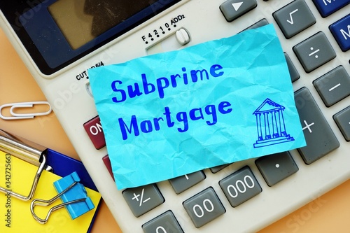 Business concept about Subprime Mortgage with sign on the page.