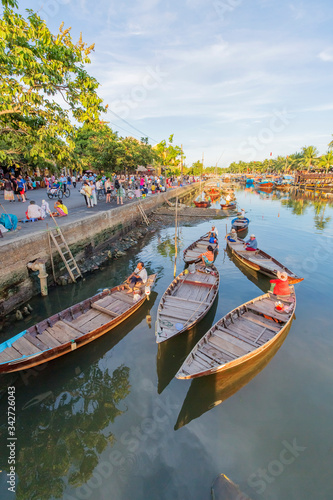 Aerial view of Hoi An ancient town, UNESCO world heritage, at Quang Nam province. Vietnam. Hoi An is one of the most popular destinations in Vietnam. Boat on Hoai river © Hien Phung
