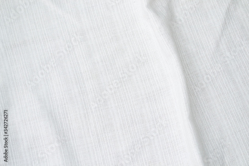 White linen fabric texture Creased or background.