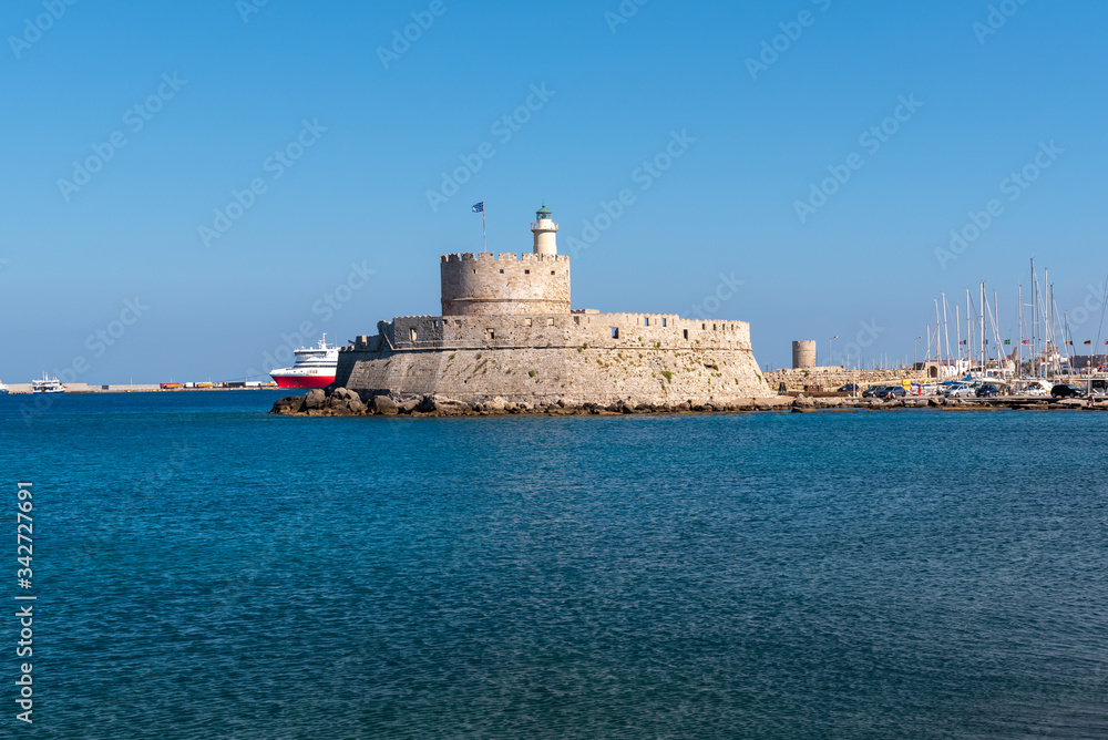The fort of St. Nicholas in Mandrakia port of Rhodes. Greece
