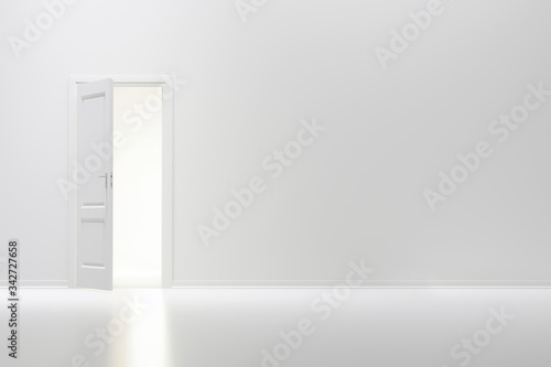 ajar door and light through it into a white room. 