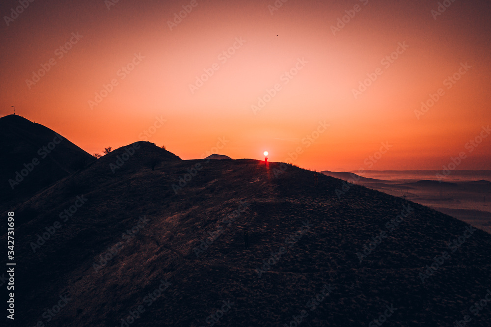 Obraz premium Rana is a significant three-peak mountain 457m. in the western part of Ceske stredohori. The Rana National Nature Reserve is situated on the south-western hill of the trike, is the center of paraglide