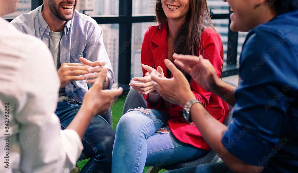 Obraz premium Group of successful young business colleague hand clapping in the office after business work done, achievement and success. teamwork and encouragement concept. 