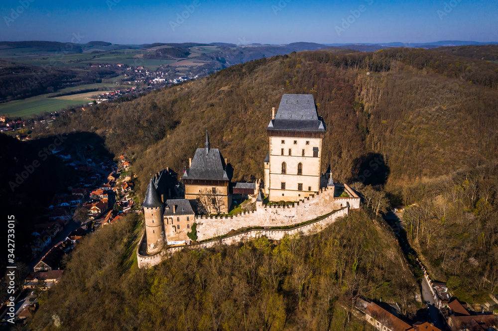 Karlstejn Castle is a large Gothic castle founded 1348 CE by Charles IV, Holy Roman Emperor-elect and King of Bohemia. There are hidden Czech crown jewels, holy relics, and other royal treasures.