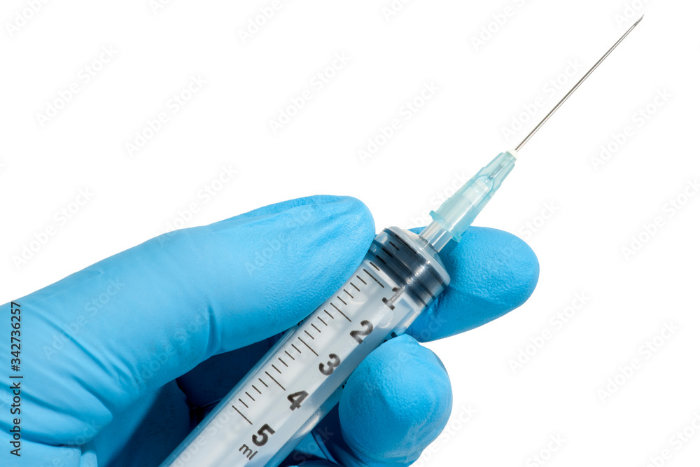 Hand of a doctor with blue glove holding a syringe isolated on white background Hand of a doctor with blue glove holding a syringe isolated on white background