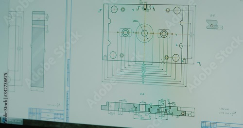 3D rendering representing an plastic injection mold development with the help of the 3d software and computer, middle plan. filmed on camera RED CINEMA