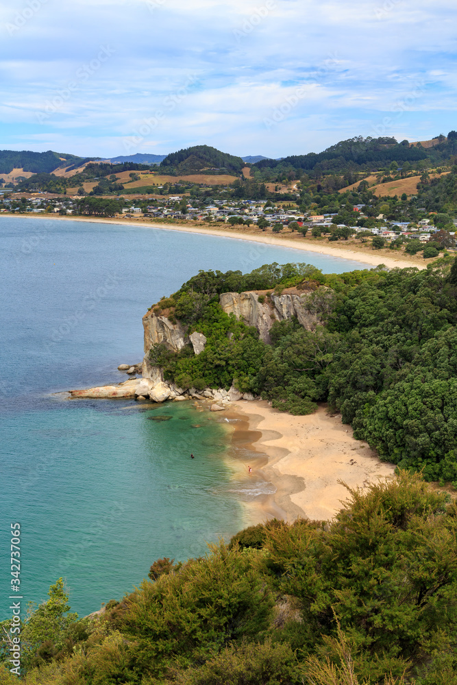 The view from Shakespeare Cliff in Mercury Bay, New Zealand, looking down on Lonely Bay and the Village of Cooks Beach 